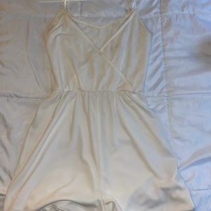 Cream colored romper with lace